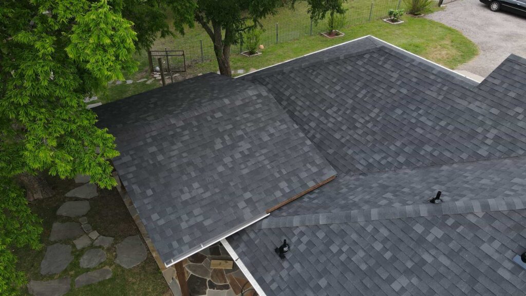 Shingle Roofing in Mount Pleasant, TX 2 Close work during shingle roofing in Mount Pleasant, Texas