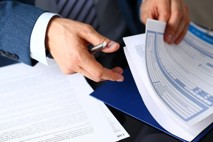 Documentation and photo evidence gathered for a roof insurance claim in Texas