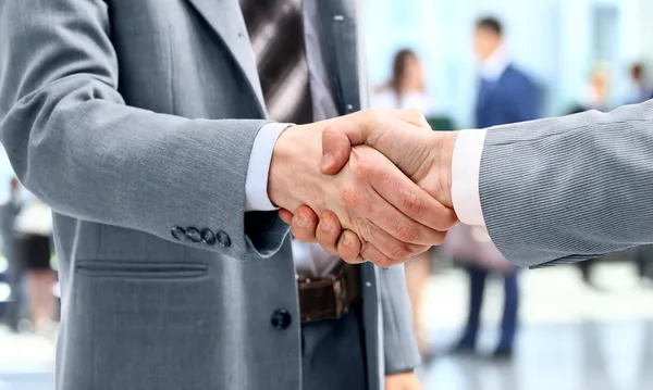 Google Guaranteed 3 depositphotos 12375049 stock photo handshake in front of business