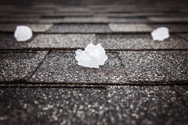 Hail storm damage in Northeast Texas - asphalt shingle roof after April 2026 storms