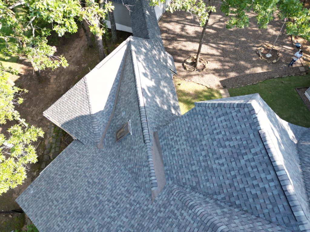 Shingle Roofing in Mount Pleasant, TX 7 Close aerial view of a steep gray architectural shingle roof