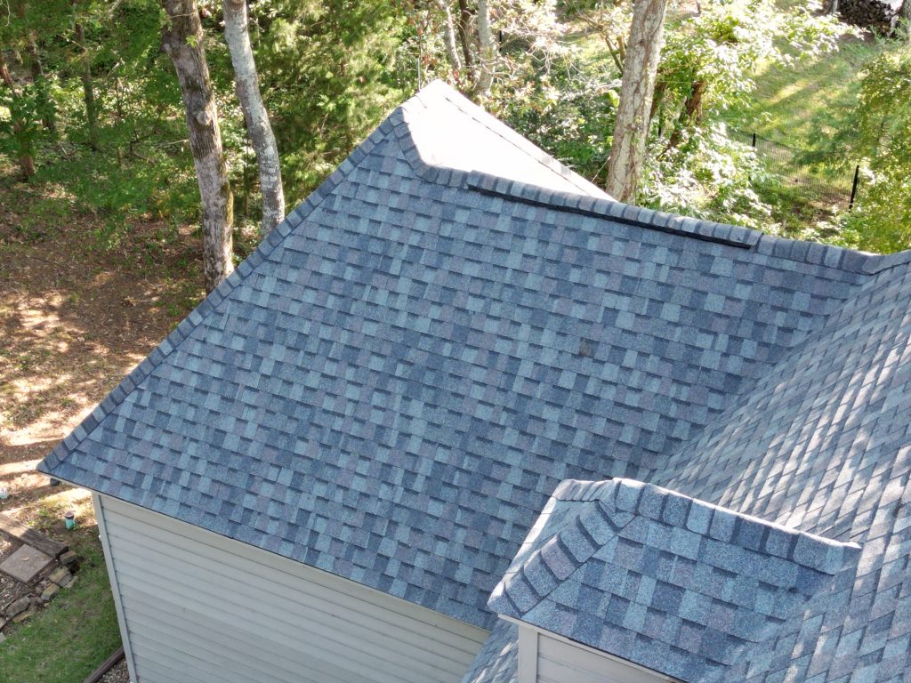 Roofing Contractor in Sulphur Bluff, TX 4 Close-up of chimney flashing on a Northeast Texas roof