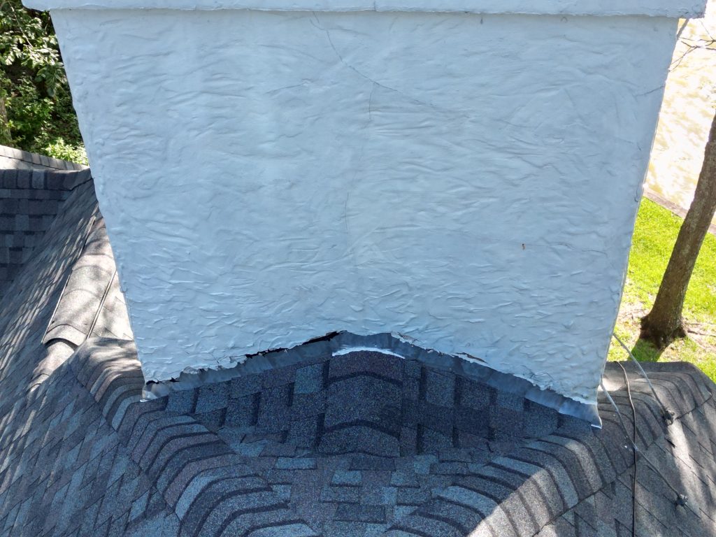 Roofing Contractor in Mount Pleasant, TX 4 Close-up of chimney flashing on a Northeast Texas roof